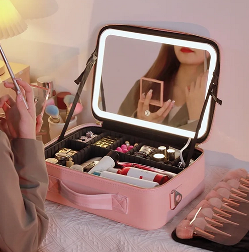 Borsa per cosmetici con specchio a luce led incorporato.